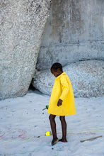 Load image into Gallery viewer, SOUTH AFRICA - cape town - girl with yellow coat on the beach
