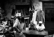 Load image into Gallery viewer, LAMU - lamu town -  shop with men on the street

