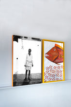 Load image into Gallery viewer, LAMU - shela - fisherman and painted fish on a wall
