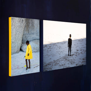 SOUTH AFRICA - cape town - girl with yellow coat on the beach